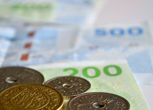 датский монеты, банкноты - danish currency стоковые фото и изображения