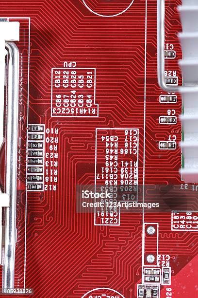 Closeup Of Electronic Circuit Red Board With Processor Of Computer Motherboard Stock Photo - Download Image Now