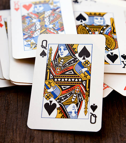 istock Pocket Queens on wooden background 485941422