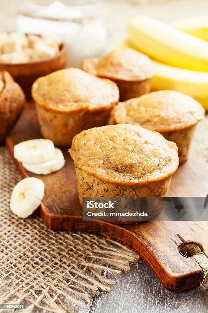 Banana muffins Homemade banana muffins on the wooden table 2015 Stock Photo