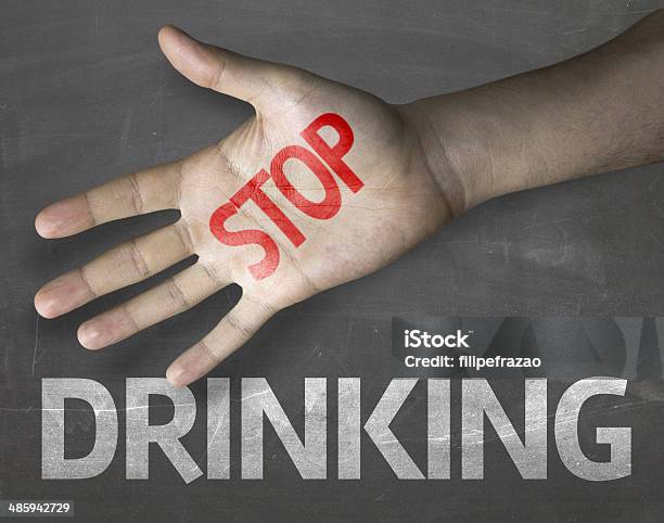 Educational And Creative Composition With The Message Stop Drinking Stock Photo - Download Image Now