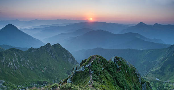 istock Sunrise on the peak in Carpathian mountains 485942960