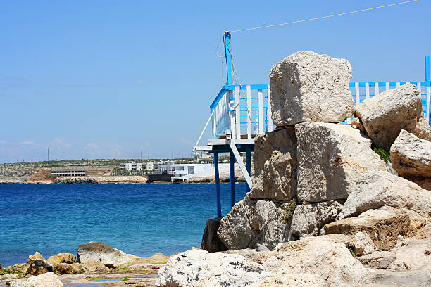 Old port on the Rocks with the sea in the background placed in Enfeh, Tripoli, Lebanon