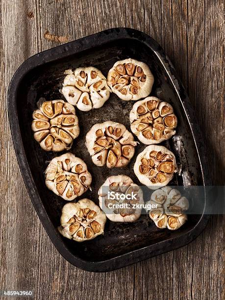 Rustic Roasted Garlic Stock Photo - Download Image Now - 2015, Baked, Baking
