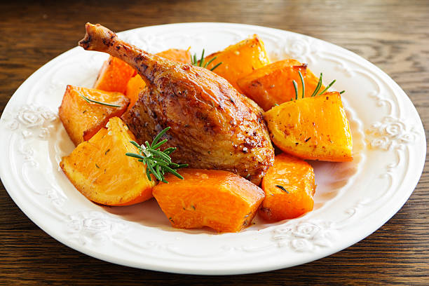 istock Roast duck with pumpkin and oranges. 485944216