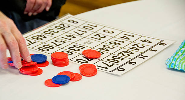 Senior playing bingo stock photo