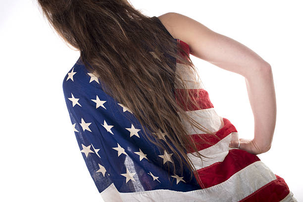 istock young woman dressed with an American flag 485946685