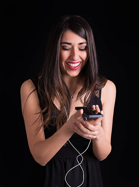 istock Girl looking at camera with headphones smiling 485948589