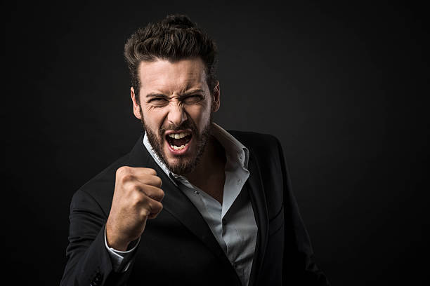 istock Angry businessman showing fists 485948844