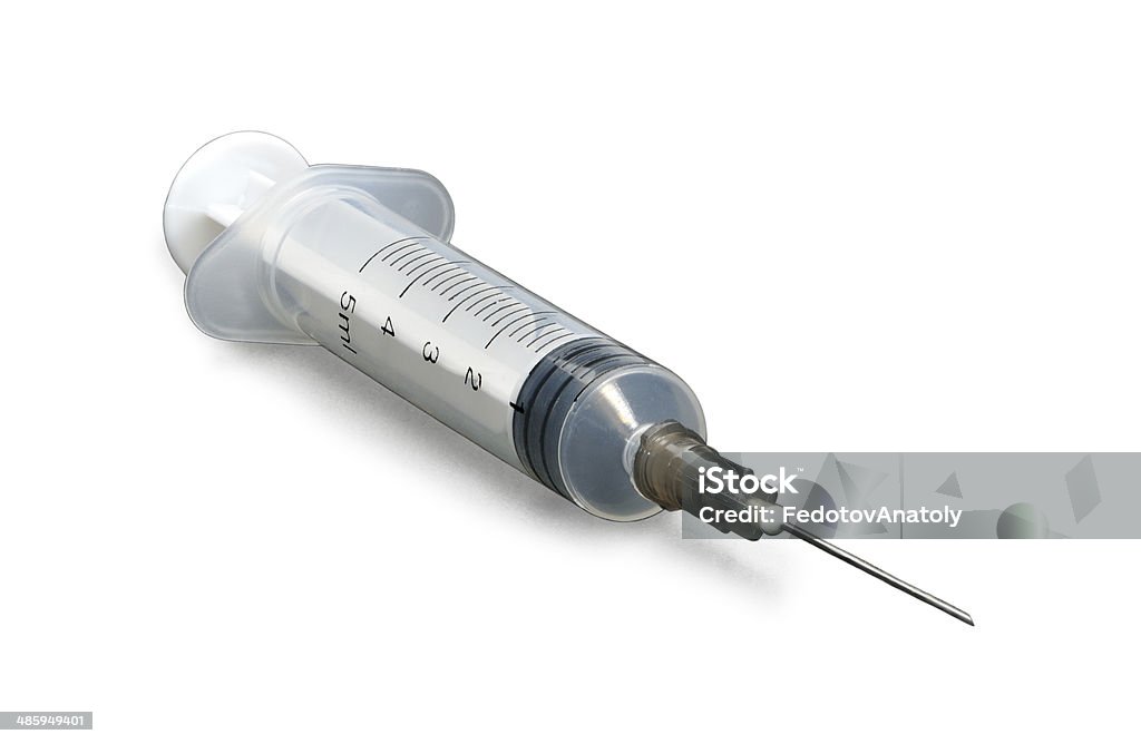 Plastic disposable syringe with a needle Plastic disposable syringe with a needle isolated on white background Syringe Stock Photo