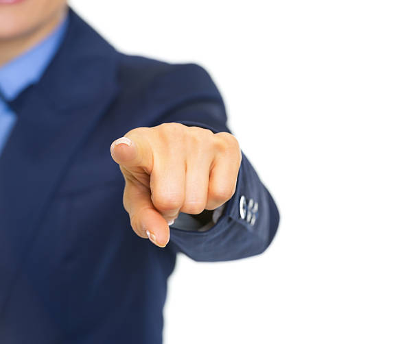 istock closeup on business woman pointing in camera 485949749