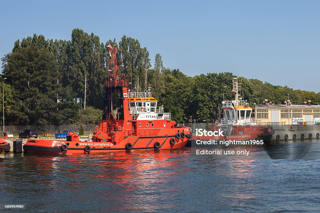 Tugboat Gdansk, Poland - August 11, 2015: Polish Tugboats Tytan and Vega moored on the wharf in the Port of Gdansk. 2015 Stock Photo