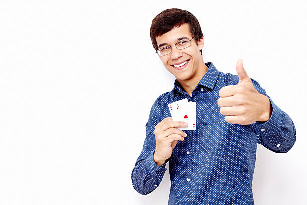 istock Guy with cards and thumb up sign 485952942