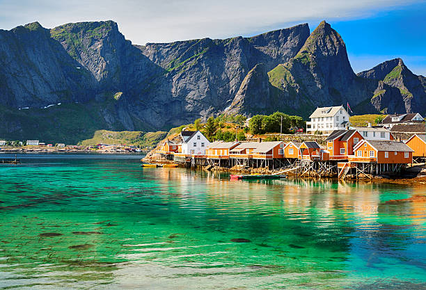 Rorbuer huts near Reine, Lofoten islands, Norway Rorbuer (rorbu) huts in Lofoten, Norway fishing village photos stock pictures, royalty-free photos & images