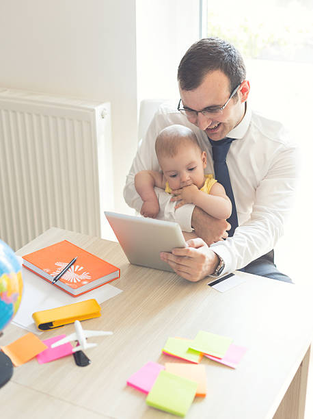 istock Father With Baby Working In Office At Home 485957434