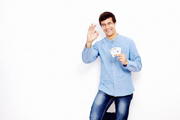 istock Guy with cards and okay sign 485959408