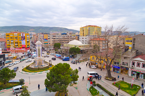 Gemlik, Turkey - March 3, 2014: View from the town center of Gemlik. Gemlik is a town and district in the Bursa Province in Turkey on the southern gulf of Armutlu Peninsula on the coast of the Sea of Marmara. It is located approximately 29 km (18 mi) from Bursa, not far from Istanbul. Gemlik was called Kios until 1922. Gemlik harbor is one of the most important harbors in Turkey. The city is renowned for olives and olive oils.