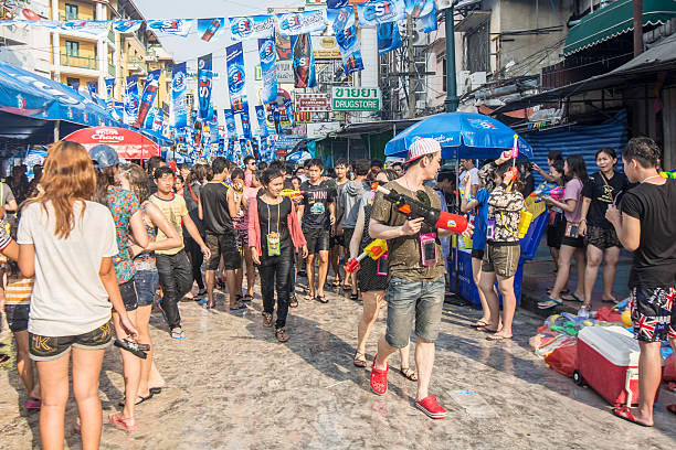 Songkran Festival Bangkok -Thailand - April 14,2014: Thai people and tourist play water on Songkran Festival is celebrated in Thailand as the traditional New Year's Day from April 13 to 15  with splashing water at each other at Khao San Road. khao san road stock pictures, royalty-free photos & images