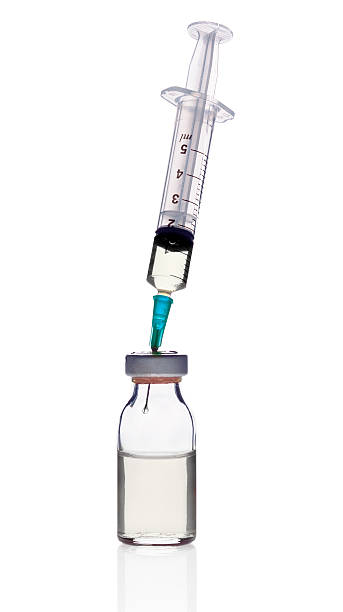 アンプルと注射器 - drop of insulin ストックフォトと画像