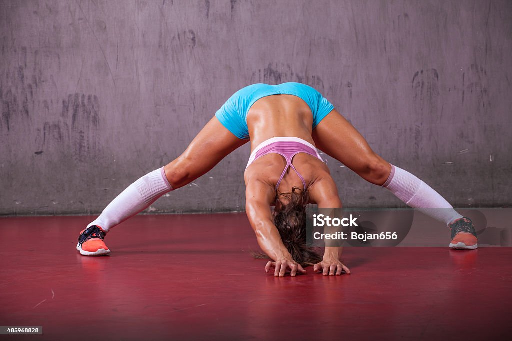 Fit Woman Stretching Fit woman stretching her leg. 20-29 Years Stock Photo