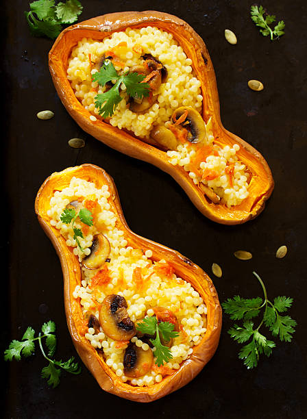 istock Pumpkin stuffed with couscous with grilled mushrooms. 485968854
