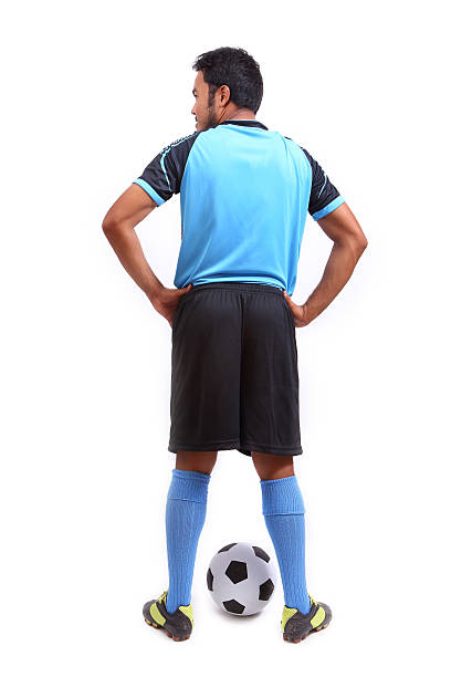 istock Young soccer football player on white 485969719
