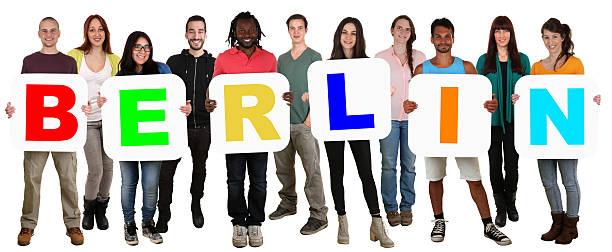 istock Group of young multi ethnic people holding word Berlin 485973658