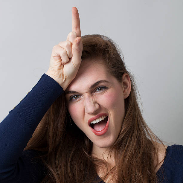 istock young extrovert woman acting like a unicorn 485976750