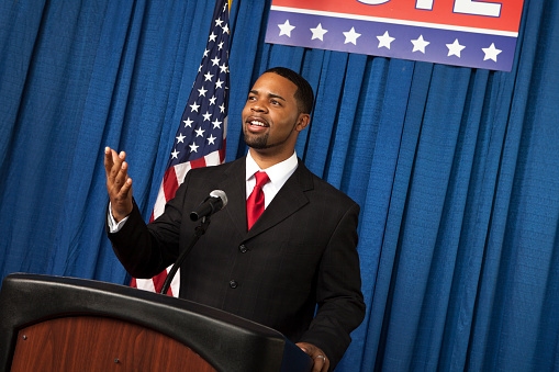 Male Politician pointing to audience