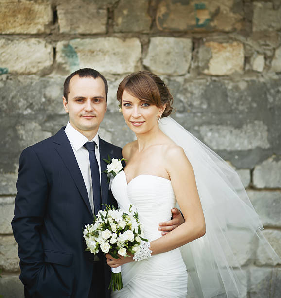 istock portrait of a young wedding couple 485979367