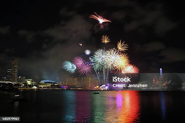 Fireworks Over Marina Bay Stock Photo - Download Image Now - Anniversary, Architecture, Bay of Water
