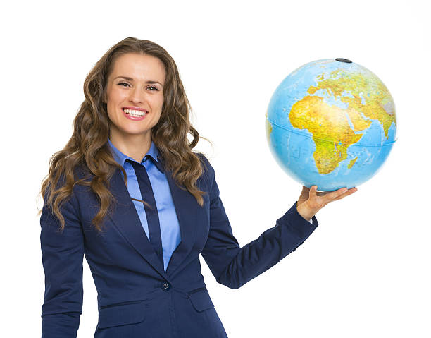 istock smiling business woman holding earth globe 485980509