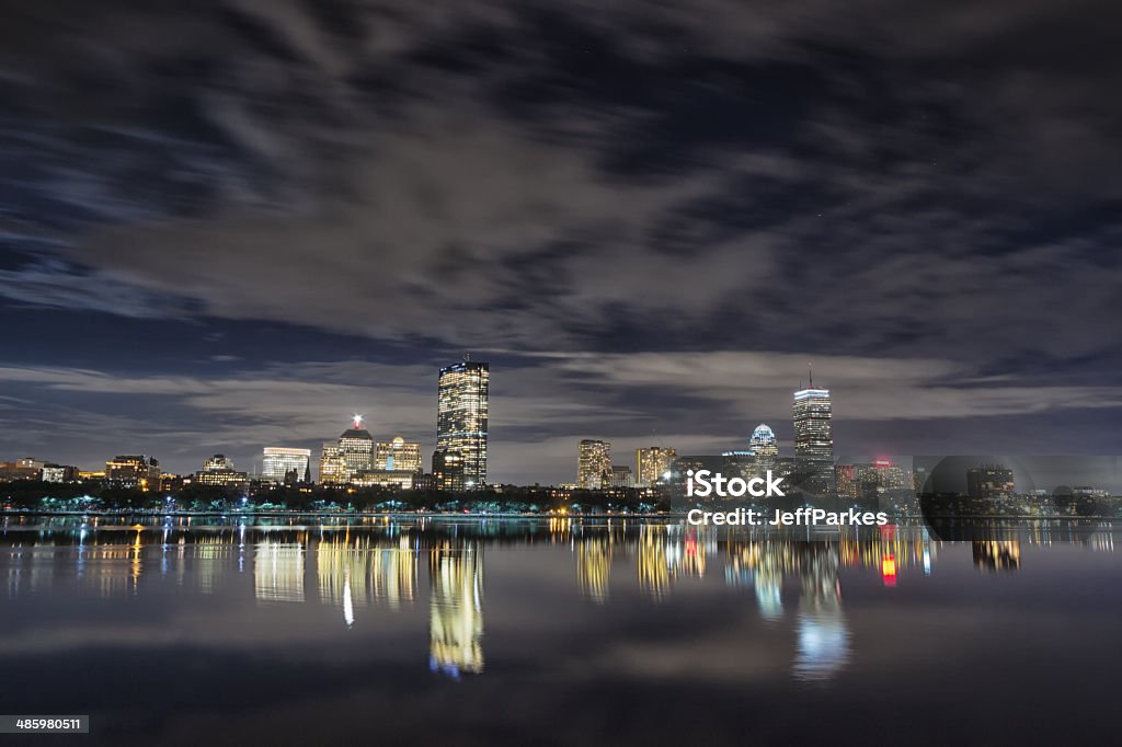 Boston Back Bay Skyline at night View of Boston at night from Memorial Drive with reflection over the Charles River Back Bay - Boston Stock Photo