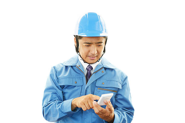 istock Portrait of a worker holding a mobile phone 485980779