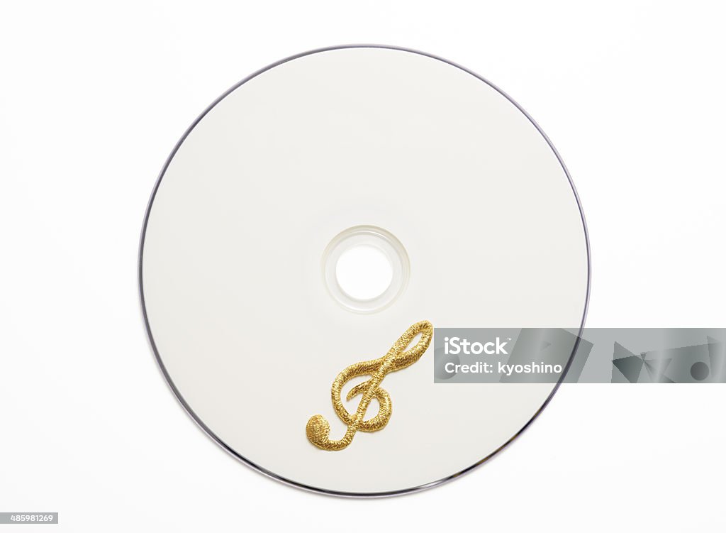 Vuoto CD con ricamo oro nota musicale su sfondo bianco - Foto stock royalty-free di Cerchio