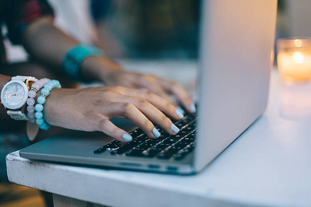 istock Close up of female hands typing on computer 485981760