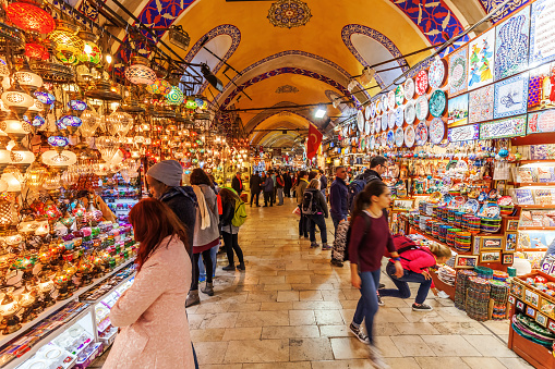 Istanbul, Turkey - April 10, 2015: Grand Bazaar in Istanbul with unidentified people. It is one of the largest and oldest covered markets in the world, with 61 covered streets and over 3,000 shops