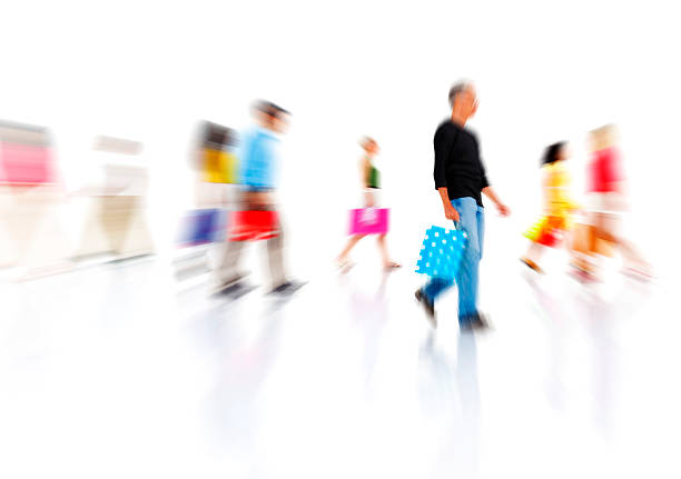Studio shot of group of colorful multi-ethnical people walking.
