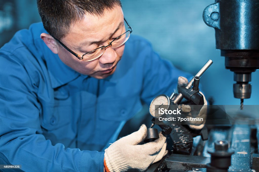 engineer on routine maintenance Accuracy Stock Photo