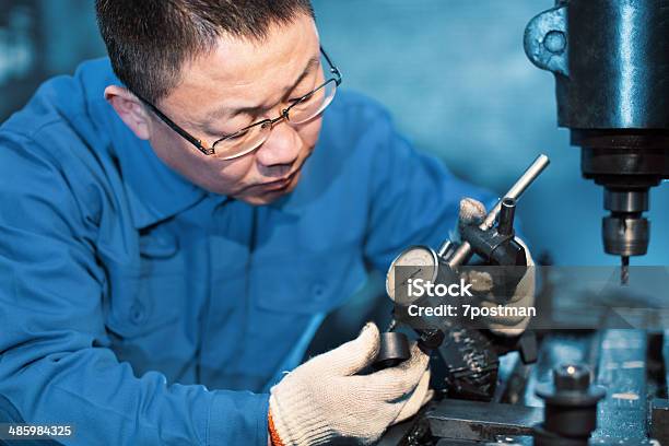 Engineer On Routine Maintenance Stock Photo - Download Image Now - Accuracy, Adult, Arts Culture and Entertainment