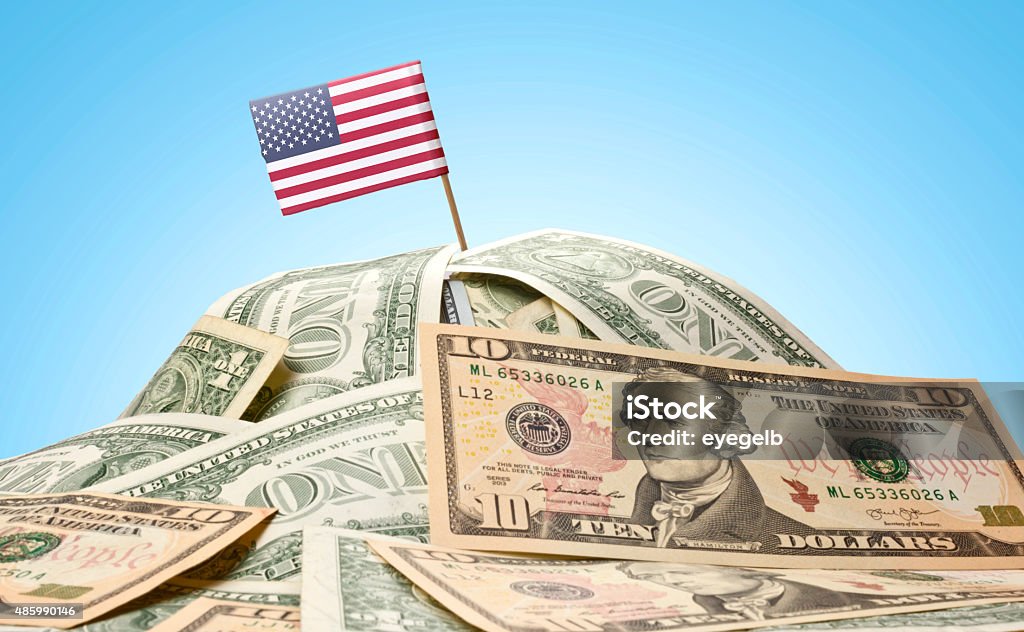 Drapeau des USA coince dans american banknotes. (série - Photo de Endettement libre de droits