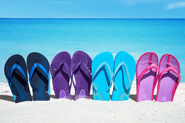 istock Some colorful  flip flops in a row 485990200