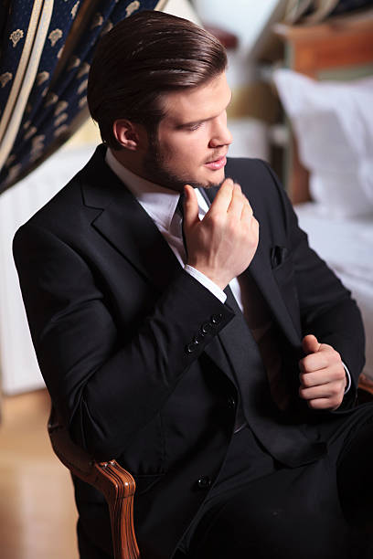 istock young business man sits on vintage chair 485998847