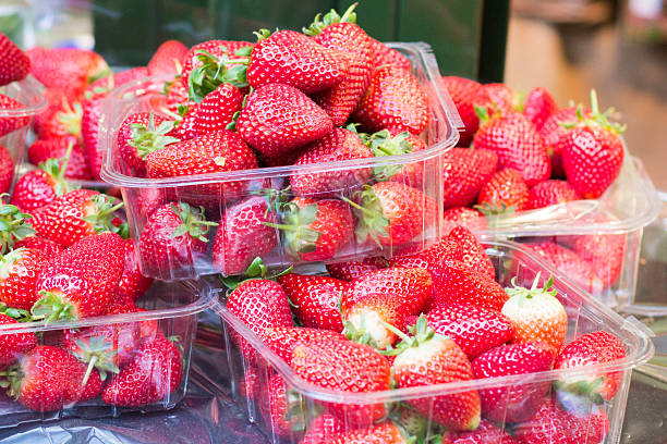 Punnets of strawberries for sale in London Borough Market