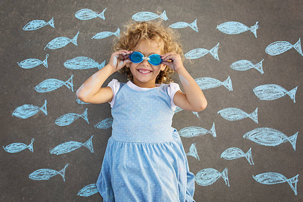 Young girl underwater imagination