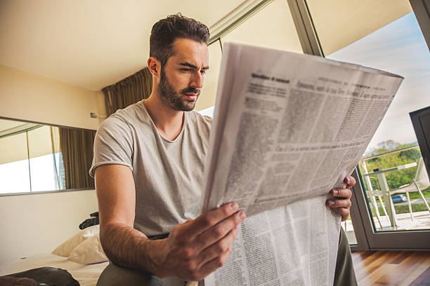 istock Man reading newspaper in the morning 486003977