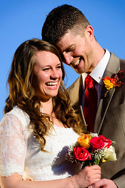 istock Portrait of Laughing Wedding Couple 486005583