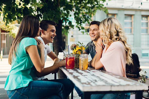 istock Young People Sitting In Cafe and talking. 486012148