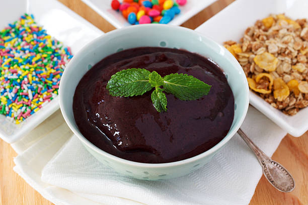 istock Brazilian dessert Acai pulp with muesli, sprinkles 486017566