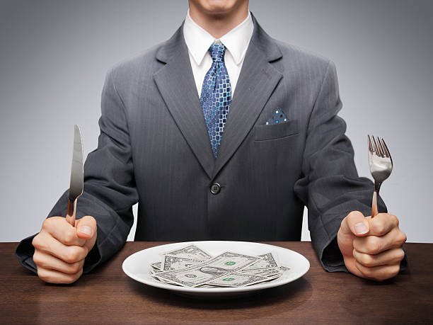 consumismo - dinner currency table business fotografías e imágenes de stock